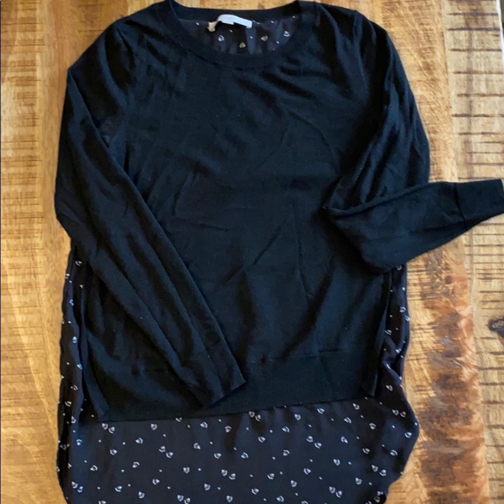 Black Loft Sweater with floral underlining.